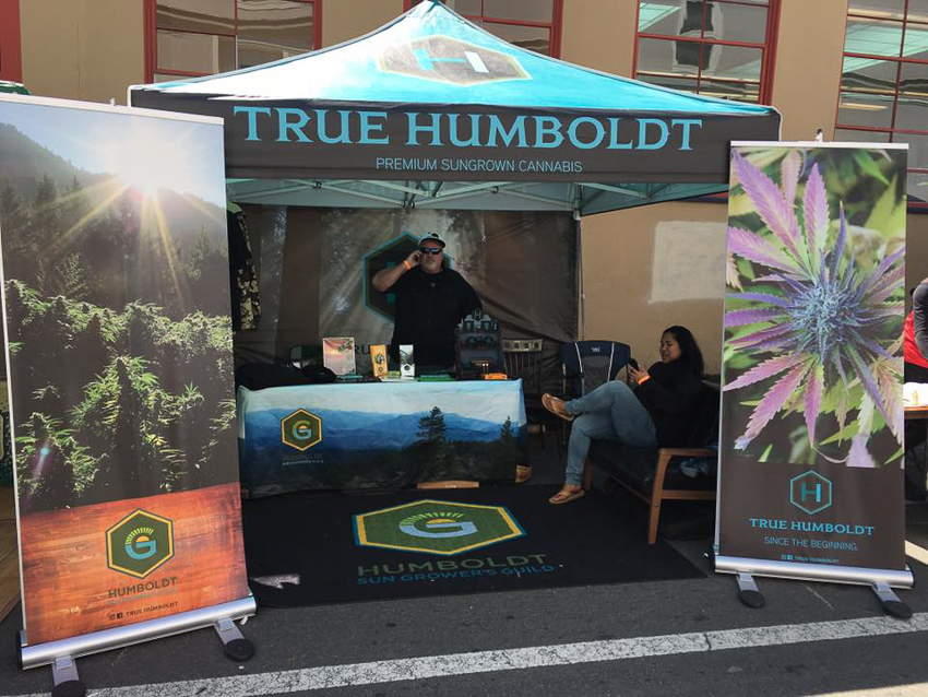 True Humboldt tent and banners
