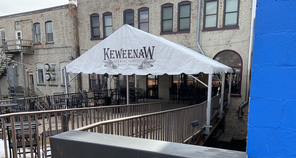 Keweenaw Brewing Co. installed a semi-permanent FutureTrac tent near its entrance to provide more covered outdoor seating.