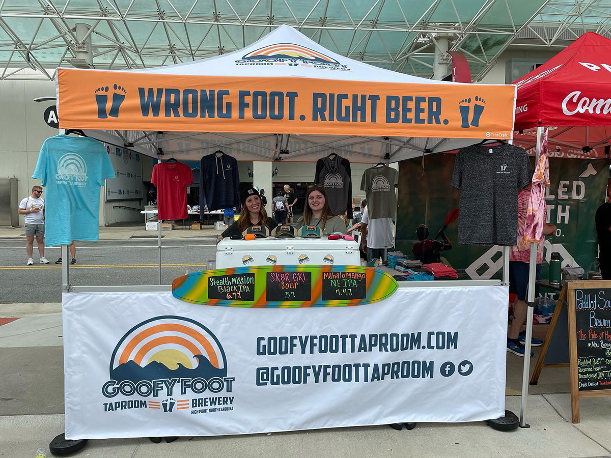 Goofy Foot Taproom and Brewery uses its heavy-duty pop-up tent to sell merch at festivals.